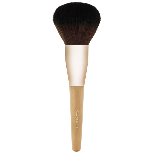 Experience the ultimate in makeup application with the Clarins Professional Powder Makeup Brush. Crafted for use with powder products, this brush features a plush, densely packed head made from soft synthetic bristles. Its ergonomic design ensures a comfortable grip, allowing for effortless blending and a seamless finish. Perfect for achieving a natural look, this essential tool will elevate your makeup routine to a professional level. Ideal for both beginners and makeup enthusiasts, add this brush to your beauty collection for flawless results every time.