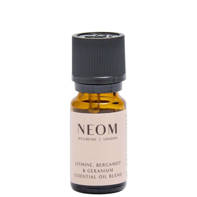 Experience the uplifting power of Neom Wellbeing's Essential Oil Blend to enhance your mood. This blend features honey-like Jasmine, refreshing Bergamot, and soothing Geranium, transporting you to a serene summer garden. Perfect for use with the Wellbeing Perfume Pod, add 5 drops to your bath or mix 1 to 2 drops with a base oil for a calming massage. Neom Wellbeing is a Certified B Corporation committed to ethical practices and making a positive impact on the planet. Elevate your wellbeing routine with this delightful blend.