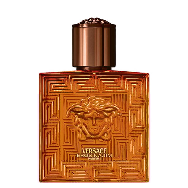 Discover the allure of Versace Eros Najim Eau de Parfum Spray 50ml, a fragrance that embodies the essence of a star. This captivating scent radiates warmth, evoking the mesmerizing sunsets of the Middle Eastern desert. With irresistible caramel notes, exotic cardamom, luxurious oud wood, earthy patchouli, and vibrant vetiver, it offers a powerful and inviting aroma. Enhanced by bright citrus notes of yellow Italian mandarin, it creates a unique olfactory experience. Apply on pulse points for a long-lasting, seductive scent.