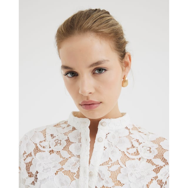 Lace fabric, Short sleeves, Curved hem, Button fasteningAbout the brandFASHION IS OUR DNARiver Island is an icon of the British high street. Inspired by the latest trends and our heritage style archives, we've been serving style and leading trends for over sixty years.We make fashion for real people with real lives, who want to look real good. Because life's a celebration - let's dress for it.
