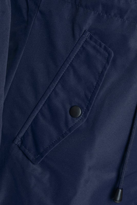 Introducing the Emily Festival Elle women’s parka – the perfect blend of style and function. Made from lightweight materials, this parka is easy to wear and perfect for layering. The addition of a hood makes it ideal for rainy days, while the stylish design ensures you’ll look great no matter the weather. Whether you’re running errands or out for a walk, the Emily Festival Elle parka is the perfect way to complete your outfit.

10% Polyester.
Machine Washable.
2 Front pockets.
No inside Pickets.