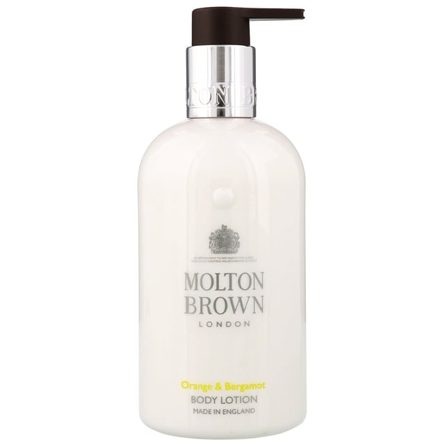 Indulge your skin with Molton Brown's Orange & Bergamot Body Lotion, a luxurious formula designed to deeply moisturize and soften. Infused with the invigorating scents of orange, bergamot, mandarin, and neroli, this lotion also features hints of cardamom, galbanum, musk, ylang-ylang, and cedarwood for a truly uplifting experience. Perfect for daily use, it leaves your skin feeling silky smooth and beautifully fragrant. Plus, as a Leaping Bunny approved brand, you can enjoy this product with the peace of mind that it is cruelty-free.