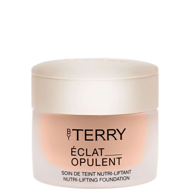Discover the luxurious By Terry Eclat Opulent No 01 Natural Radiance, a makeup essential designed to enhance your complexion. Founded by renowned makeup artist Terry de Gunzburg, By Terry blends innovation and elegance in every product. This brightening formula is perfect for mature skin and effectively combats sun damage, providing medium coverage that smooths and revitalizes your skin. Experience a radiant, youthful glow with this must-have addition to your beauty routine. Elevate your makeup game with By Terry's signature quality that ensures a flawless finish every time.