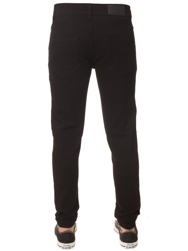 Upgrade your child’s denim collection with the stylish Enzo Boys Skinny Jeans. Designed with a modern slim fit, these jeans feature a classic 5-pocket design for everyday practicality and a button fly for a secure closure. Perfect for casual wear or dressing up, these versatile jeans offer a sleek look while ensuring comfort and freedom of movement. A must-have staple for any boy’s wardrobe!