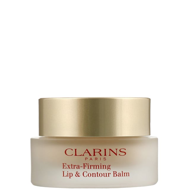Experience the ultimate hydration and rejuvenation with Clarins Extra-Firming Lip & Contour Balm. This luxurious balm is enriched with nourishing Raspberry Seed Oil and Shea Butter to effectively soothe, smooth, and repair cracked or chapped lips. It also helps diminish fine lines and wrinkles around the lip contour, giving you a youthful appearance. For best results, apply directly to your lips and the surrounding area, gently massaging for optimal absorption. Treat your lips to the care they deserve and enjoy a plump, youthful smile.