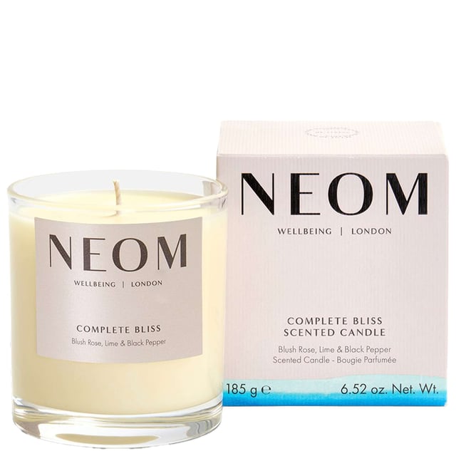 Neom Wellbeing London Complete Bliss Scented Candle - Calm & Relax (185g, 1 Wick) Experience tranquility with Neom Wellbeing London's Complete Bliss Scented Candle. This 185g candle creates a calming atmosphere in your home, helping you unwind. Infused with 17 essential oils, including Moroccan Blush Rose, Lime, and Black Pepper, it promotes relaxation and eases tension. Light this candle for up to 35 hours of soothing ambiance. Neom is a Certified B Corporation, committed to ethical practices and environmental sustainability, ensuring that your choice supports both your wellbeing and the planet.