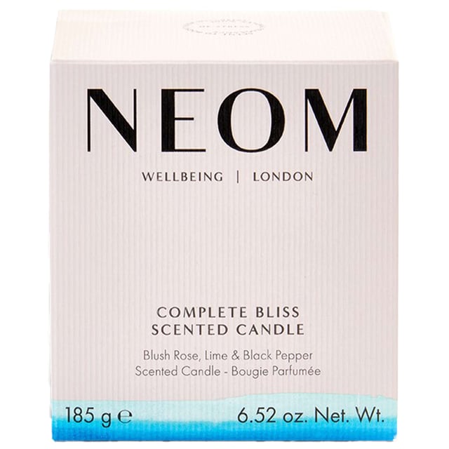 Neom Wellbeing London Complete Bliss Scented Candle - Calm & Relax (185g, 1 Wick) Experience tranquility with Neom Wellbeing London's Complete Bliss Scented Candle. This 185g candle creates a calming atmosphere in your home, helping you unwind. Infused with 17 essential oils, including Moroccan Blush Rose, Lime, and Black Pepper, it promotes relaxation and eases tension. Light this candle for up to 35 hours of soothing ambiance. Neom is a Certified B Corporation, committed to ethical practices and environmental sustainability, ensuring that your choice supports both your wellbeing and the planet.