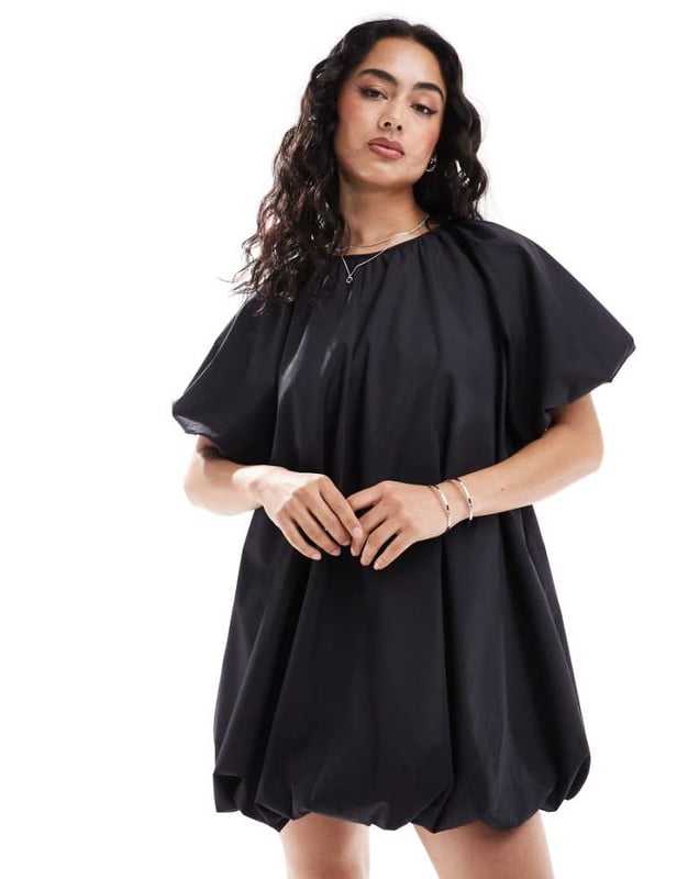 Dresses by ASOS DESIGN Low effort, high reward Plain design Round neck Puff sleeves Button-keyhole back Regular fitSold By: Asos