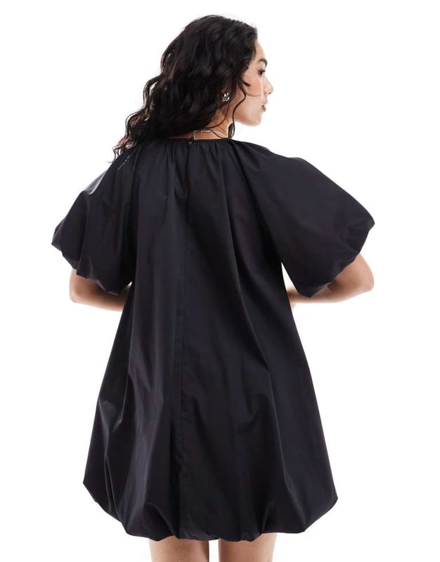 Dresses by ASOS DESIGN Low effort, high reward Plain design Round neck Puff sleeves Button-keyhole back Regular fitSold By: Asos