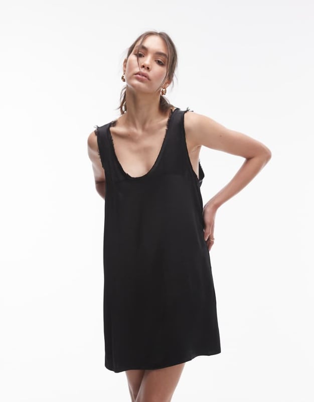Dresses by Topshop This is Topshop Scoop neck Sleeveless style Tie-back fastening Relaxed fitSold By: Asos