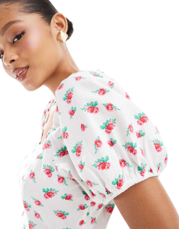 Dresses by Vero Moda Mini dress, major impact Floral design Sweetheart neck Puff sleeves Regular fitSold By: Asos
