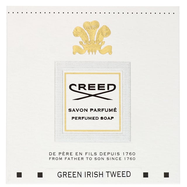 Experience the essence of luxury with Creed Green Irish Tweed Perfumed Soap. This 150g bar is infused with a sophisticated fragrance that embodies bold confidence and refinement. Inspired by the lush landscapes of the Emerald Isle, it combines top notes of zesty lemon, aromatic Indian verbena, and refreshing peppermint with a heart of delicate violet. The rich base notes of iris, sandalwood, and cedarwood create a warm and inviting finish. Indulge your senses with this exquisite soap that transforms your daily cleansing routine into a lavish experience.