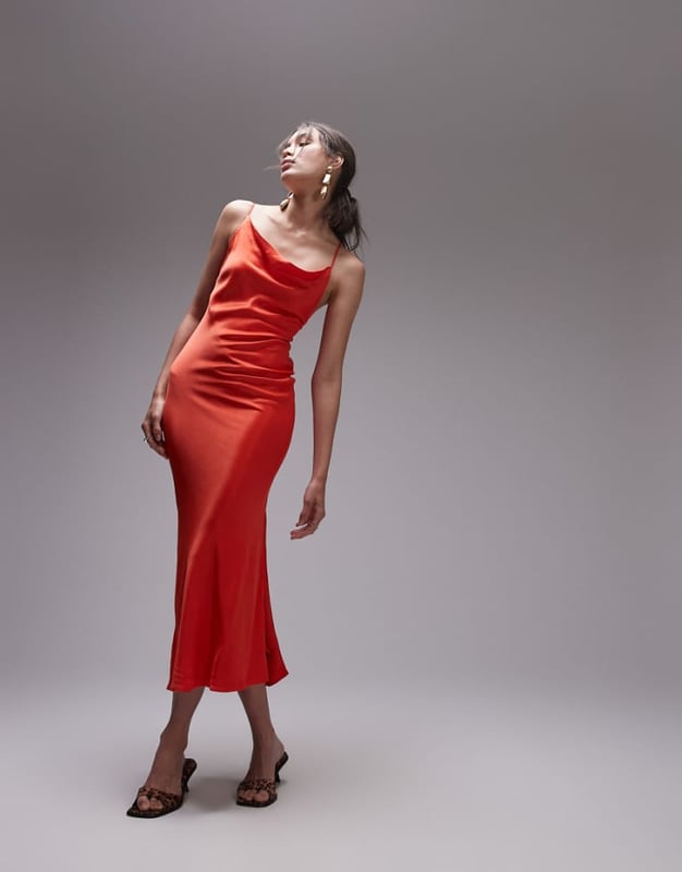 Dresses by Topshop This is Topshop Cowl neck Zip-back fastening Side split Regular fitSold By: Asos