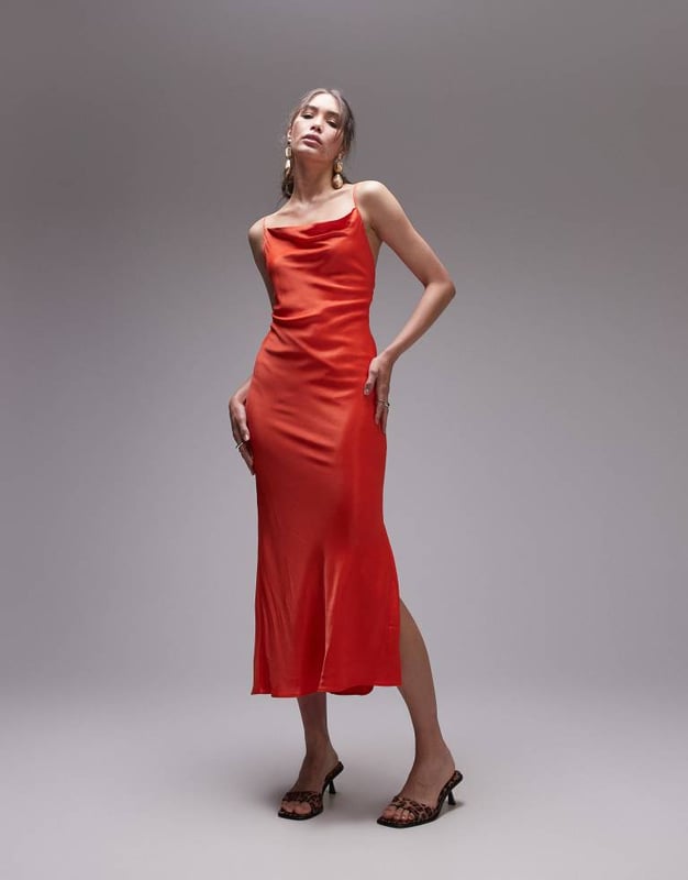 Dresses by Topshop This is Topshop Cowl neck Zip-back fastening Side split Regular fitSold By: Asos