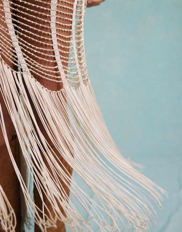 Dresses by Miss Selfridge May cause compliments V-neck Fixed straps All-over bead embellishment Scoop back Fringe hem Regular fitSold By: Asos