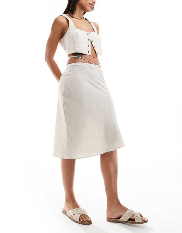 Skirts by ASOS DESIGN AM-to-PM potential Low rise Tie-back fastening Textured finish Regular fitSold By: Asos