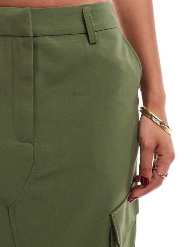 Skirts by Vero Moda Midi moment High rise Belt loops Functional pockets Front split Regular fitSold By: Asos