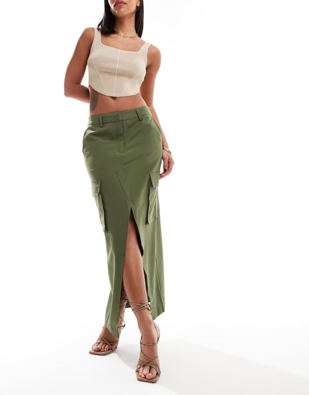 Skirts by Vero Moda Midi moment High rise Belt loops Functional pockets Front split Regular fitSold By: Asos