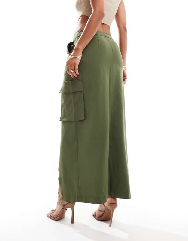 Skirts by Vero Moda Midi moment High rise Belt loops Functional pockets Front split Regular fitSold By: Asos