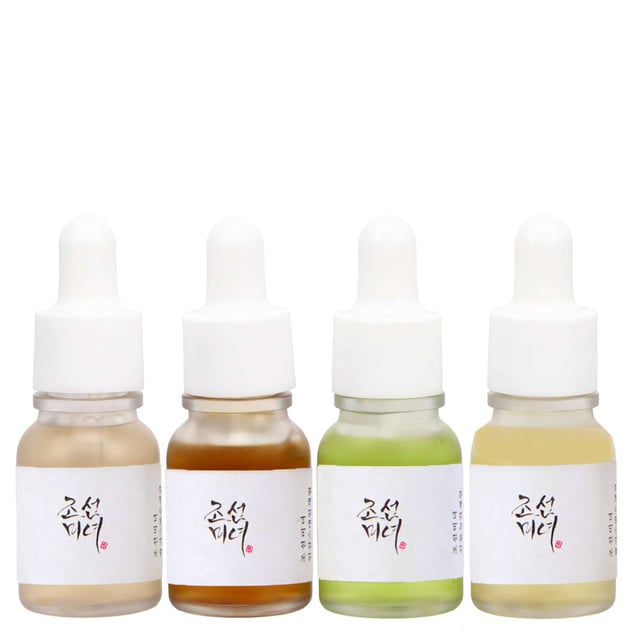 Discover the transformative power of the Beauty of Joseon Hanbang Serum Discovery Kit. This collection features four 10ml serums, each targeting specific skin concerns for a customized skincare routine. The kit includes: Calming Serum with Green Tea & Panthenol for soothing sensitive skin, Glow Serum with Propolis & Niacinamide for minimizing pores, Glow Deep Serum with Rice Bran Water & Arbutin for brightening, and Revive Serum with Ginseng Root & Snail Mucin for enhancing elasticity. Perfect for all skin types, this cruelty-free set is your gateway to healthier, radiant skin.