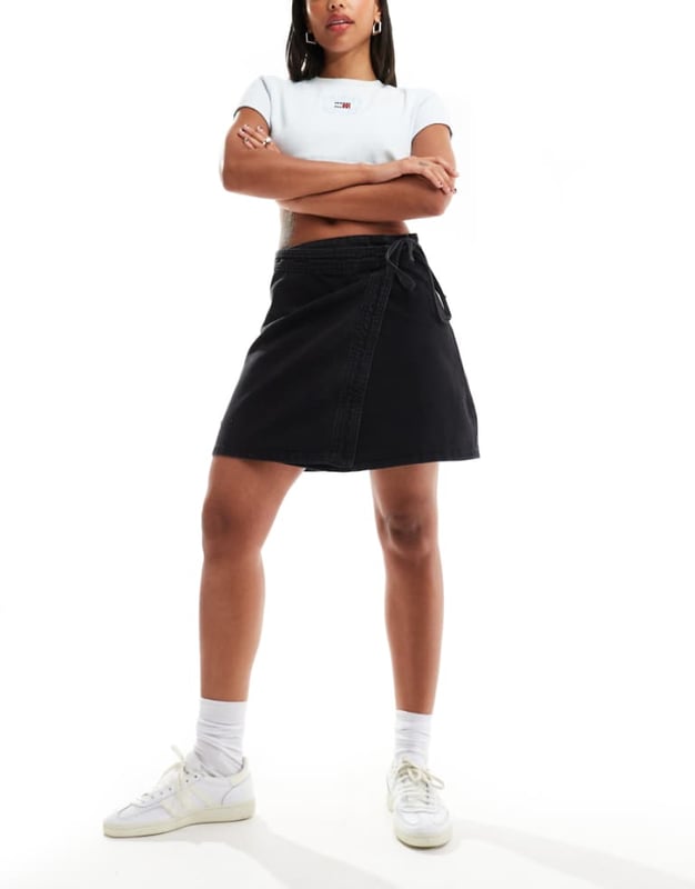 Skirts by ONLY Give your trousers a day off Mid rise Wrap front Tie waist Regular fitSold By: Asos