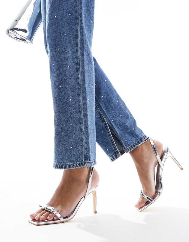Shoes by Glamorous Give your feet some airtime Adjustable strap Pin-buckle fastening Bow detail Open toe Stiletto heelSold By: Asos