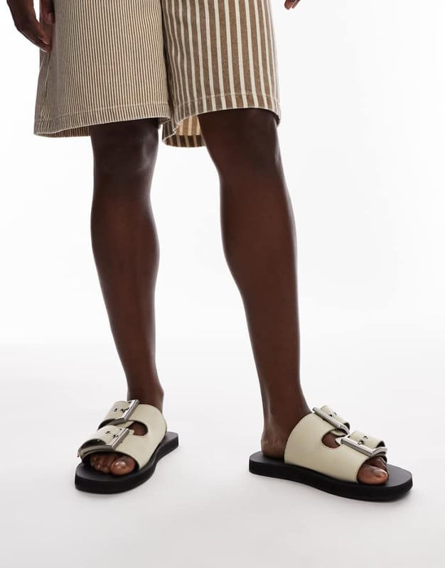 Shoes by Topshop This is Topshop Adjustable strap Pin-buckle fastening Open toe Flat soleSold By: Asos