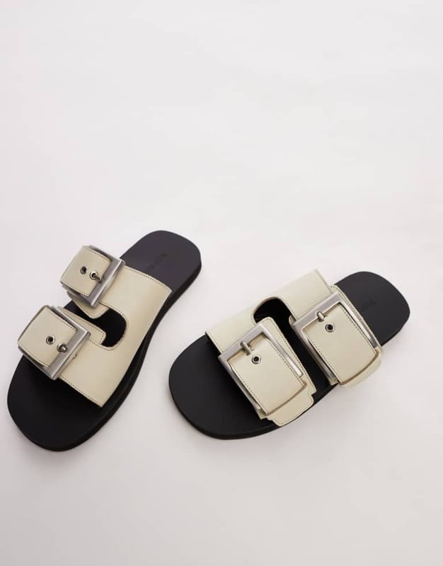 Shoes by Topshop This is Topshop Adjustable strap Pin-buckle fastening Open toe Flat soleSold By: Asos