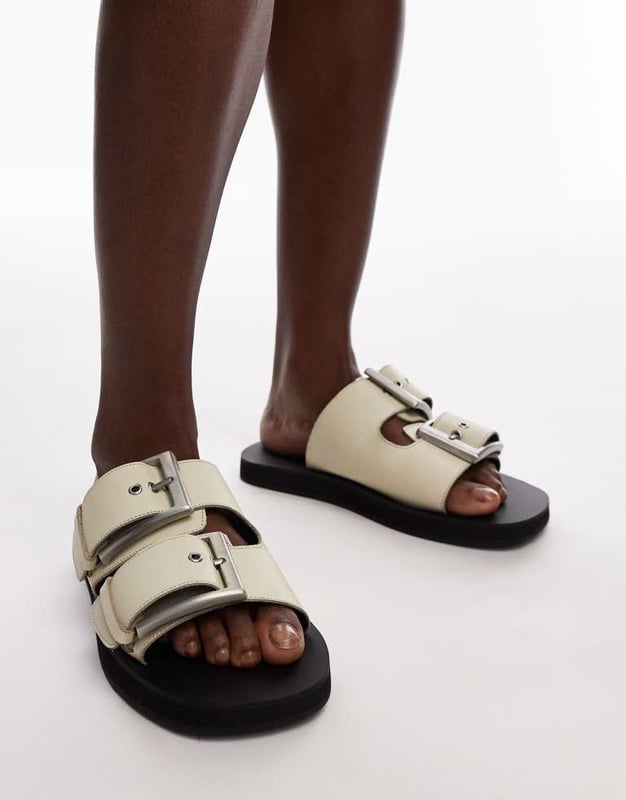Shoes by Topshop This is Topshop Adjustable strap Pin-buckle fastening Open toe Flat soleSold By: Asos