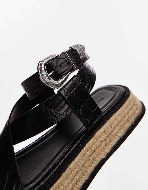 Shoes by Topshop Step into summer Adjustable strap Pin-buckle fastening Toe loop Open toe Cross strap Woven mid-sole Chunky soleSold By: Asos