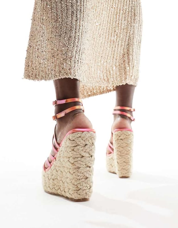 Shoes by Simmi Wide Fit Step into summer Strappy design Adjustable straps Pin-buckle fastening Open toe Rope midsole High wedge heelSold By: Asos