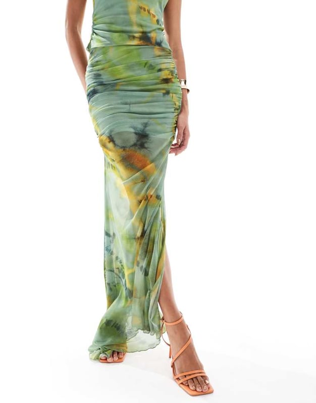 Skirts by ASOS DESIGN Part of a co-ord set Top sold separately Tie-dye design High rise Elasticated waist Ruched sides Side split Slim fitSold By: Asos