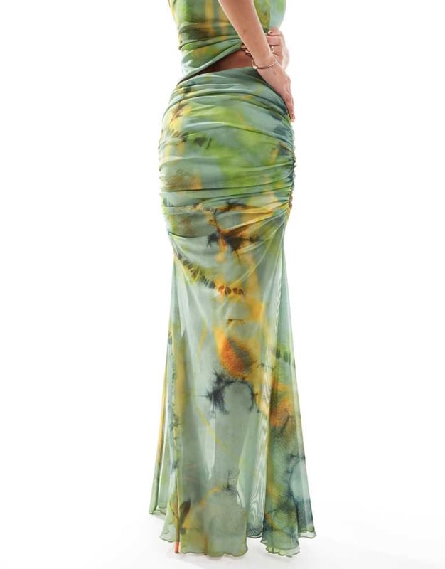 Skirts by ASOS DESIGN Part of a co-ord set Top sold separately Tie-dye design High rise Elasticated waist Ruched sides Side split Slim fitSold By: Asos