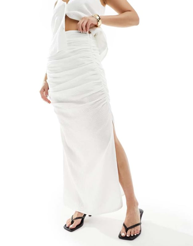 Skirts by Kaiia Lower-half looks High rise Side split Regular fitSold By: Asos