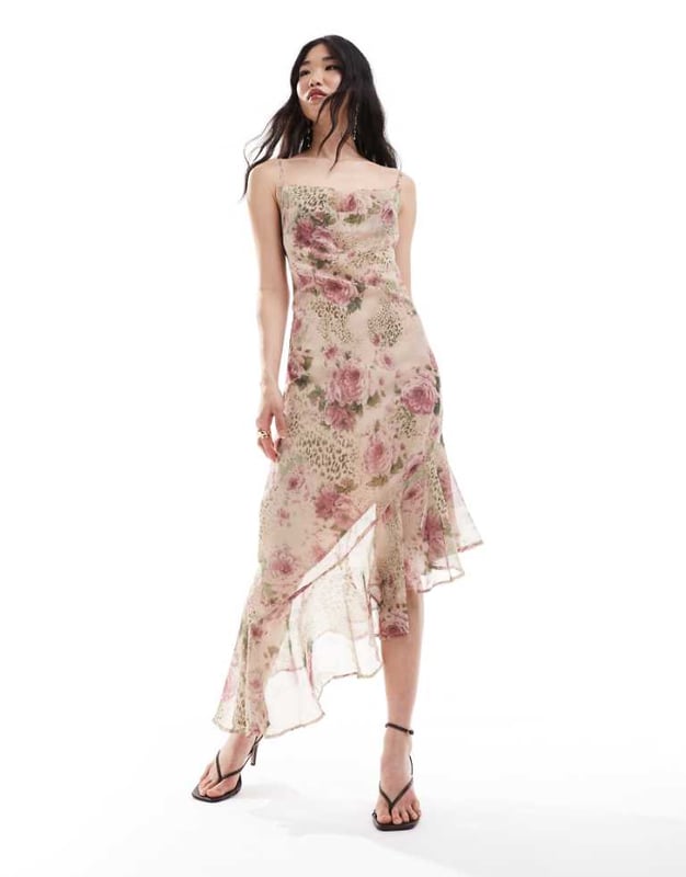 Skirts by Miss Selfridge Let's hear it for the dress Mixed print Cowl neck Fixed straps Lace-up back Asymmetric hem Regular fitSold By: Asos