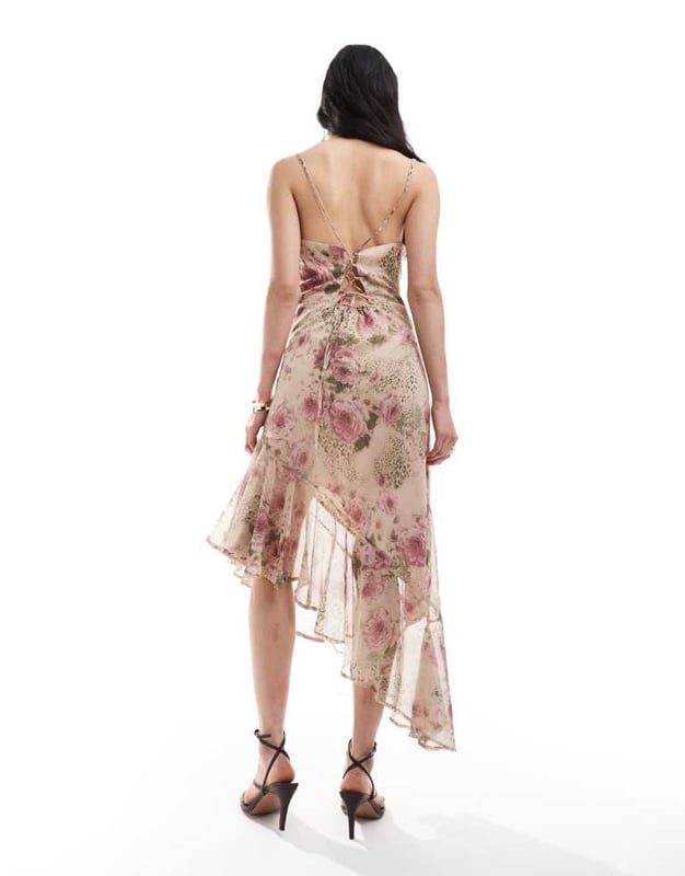Skirts by Miss Selfridge Let's hear it for the dress Mixed print Cowl neck Fixed straps Lace-up back Asymmetric hem Regular fitSold By: Asos
