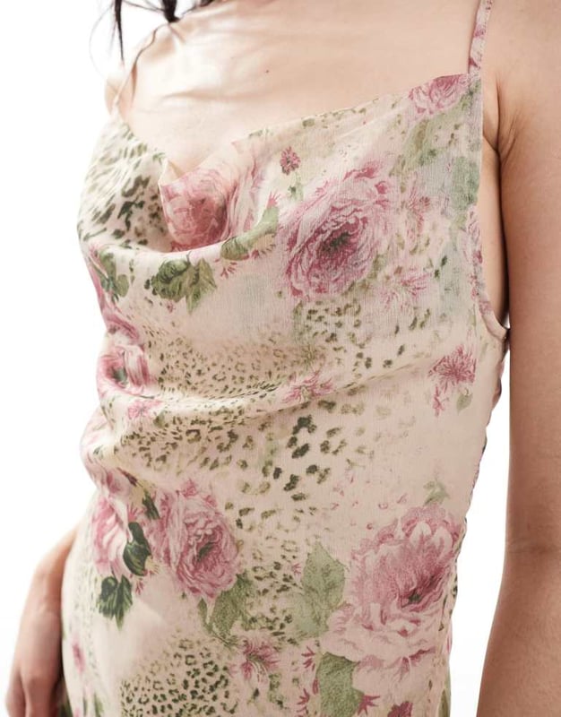 Skirts by Miss Selfridge Let's hear it for the dress Mixed print Cowl neck Fixed straps Lace-up back Asymmetric hem Regular fitSold By: Asos