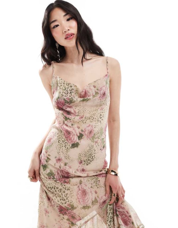 Skirts by Miss Selfridge Let's hear it for the dress Mixed print Cowl neck Fixed straps Lace-up back Asymmetric hem Regular fitSold By: Asos