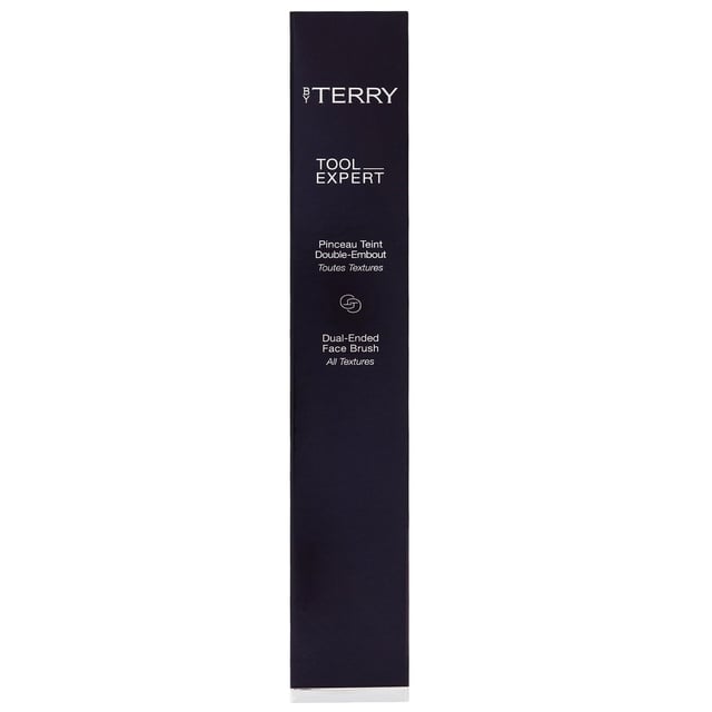 Discover the By Terry Tool-Expert Dual-Ended Makeup Brush, designed by renowned makeup artist Terry de Gunzburg. With over 30 years of experience, Terry has revolutionized the beauty industry since founding By Terry in 1998. This luxurious brush features a flat side for applying liquid and cream foundations effortlessly, while the domed side is perfect for pressed and loose powders. Achieve a professional-quality finish with every use, as this brush ensures even product distribution for a smooth look. Elevate your makeup routine with this essential tool that combines convenience and efficacy.