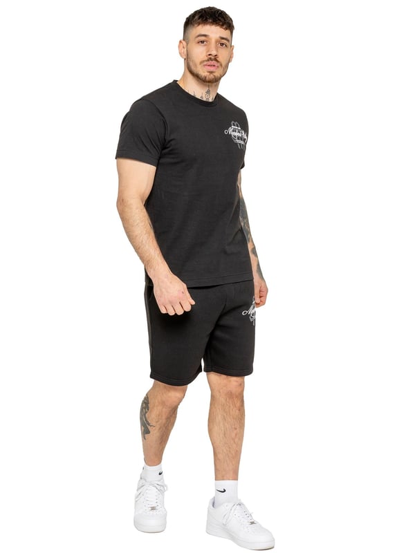 Step up your casual style with the Enzo Milano Men's Printed T-Shirt & Shorts Set. The regular-fit tee features bold "Members Only" puff prints on the front and back, with a ribbed crew neck for comfort and style. The matching fleece-lined shorts offer a relaxed fit, adjustable drawstring waist, and side pockets, finished with a striking puff print on the leg. Perfect for everyday wear with a modern streetwear edge.