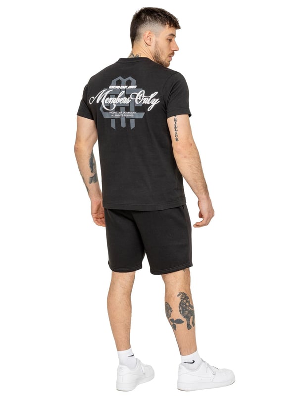 Step up your casual style with the Enzo Milano Men's Printed T-Shirt & Shorts Set. The regular-fit tee features bold "Members Only" puff prints on the front and back, with a ribbed crew neck for comfort and style. The matching fleece-lined shorts offer a relaxed fit, adjustable drawstring waist, and side pockets, finished with a striking puff print on the leg. Perfect for everyday wear with a modern streetwear edge.