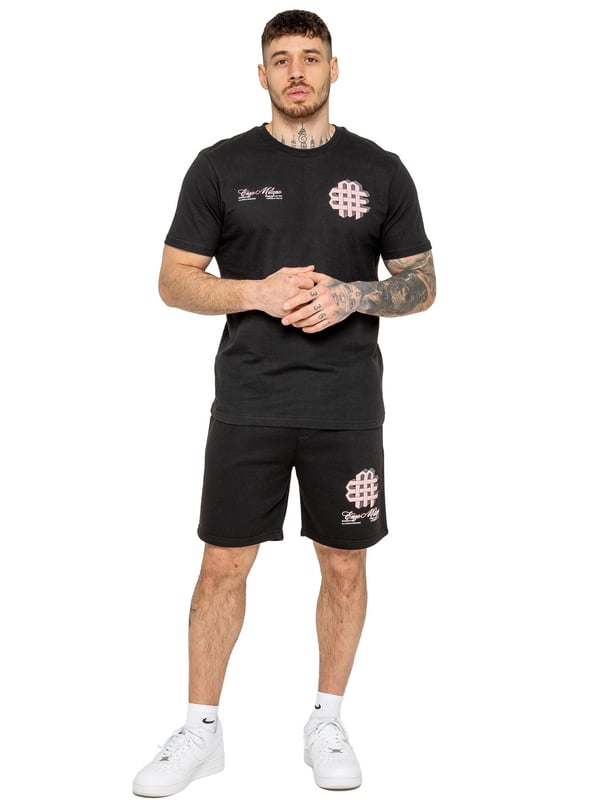 Stay stylish and comfortable with the Enzo Milano Men's Printed T-Shirt & Shorts Set. The cotton T-shirt features a bold puff print on the front and back, with a ribbed crew neck and regular fit for all-day ease. Paired with fleece-lined shorts, this set is perfect for casual days. The shorts offer a regular fit, elasticated waistband with drawstring, side pockets, and a matching puff print graphic for a standout look.