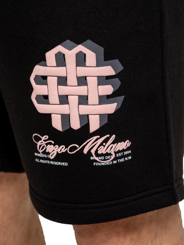 Stay stylish and comfortable with the Enzo Milano Men's Printed T-Shirt & Shorts Set. The cotton T-shirt features a bold puff print on the front and back, with a ribbed crew neck and regular fit for all-day ease. Paired with fleece-lined shorts, this set is perfect for casual days. The shorts offer a regular fit, elasticated waistband with drawstring, side pockets, and a matching puff print graphic for a standout look.
