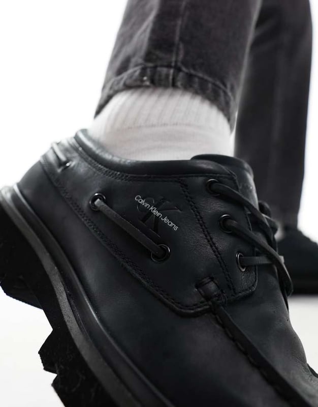 Shoes, Boots & Trainers by Calvin Klein Jeans Good things come in pairs Lace-up fastening Signature Calvin Klein branding Round toe Chunky sole Lugged treadSold By: Asos