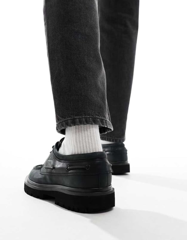 Shoes, Boots & Trainers by Calvin Klein Jeans Good things come in pairs Lace-up fastening Signature Calvin Klein branding Round toe Chunky sole Lugged treadSold By: Asos