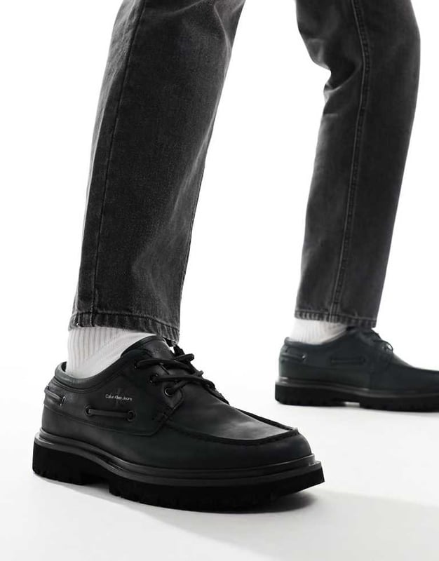 Shoes, Boots & Trainers by Calvin Klein Jeans Good things come in pairs Lace-up fastening Signature Calvin Klein branding Round toe Chunky sole Lugged treadSold By: Asos