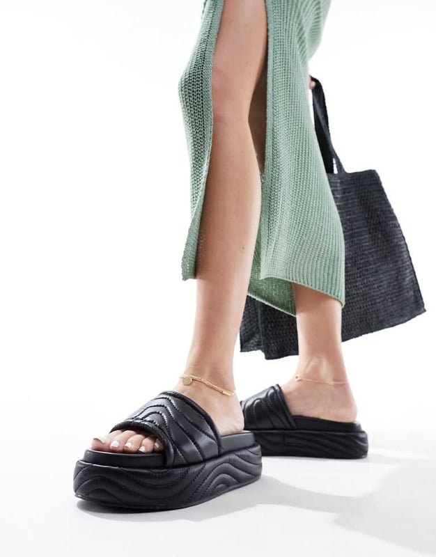 Shoes by Public Desire Wide Fit Sun's out, toes out Quilted design Wide strap Open toe Flatform sole Wide fitSold By: Asos