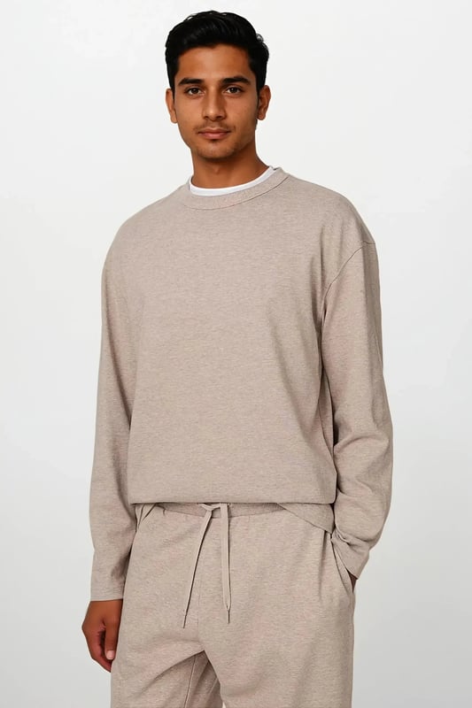 This long-sleeved pure cotton t-shirt is perfect for laid-back days. Made to an oversized fit from soft and breathable cotton. A crew neck and dropped shoulders add to its relaxed feel.

28" Shoulder to Hem.