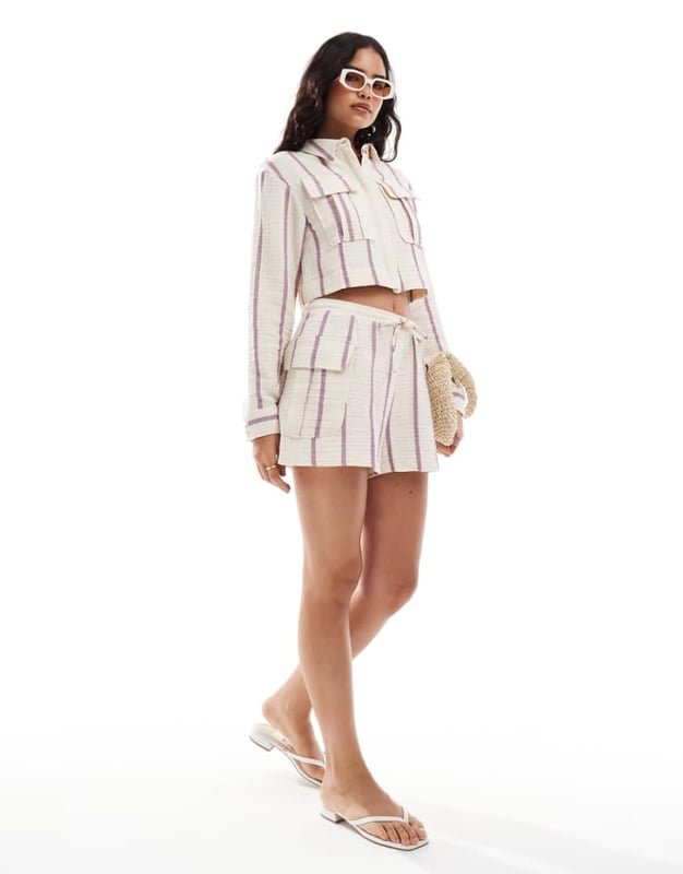 Shorts by ASOS DESIGN Part of a co-ord set Shirt sold separately High rise Elasticated drawstring waist Pocket details Regular fitSold By: Asos