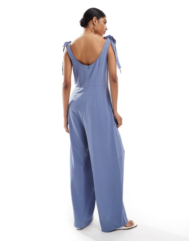 Jumpsuits & Playsuits by ASOS DESIGN Thanks, it's ASOS Scoop neck Tie straps Zip-back fastening Wide leg Regular fitSold By: Asos